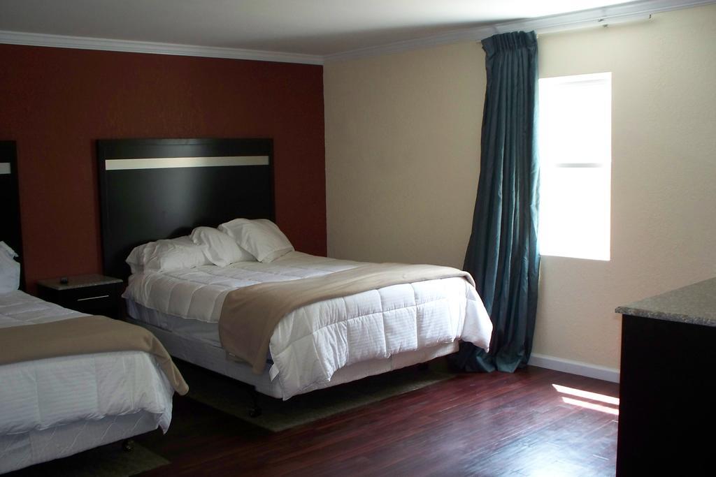 Budget Inn & Suites Wall Extérieur photo