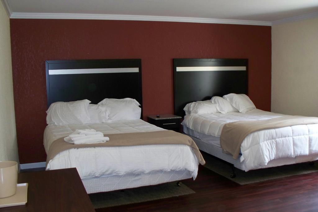 Budget Inn & Suites Wall Extérieur photo